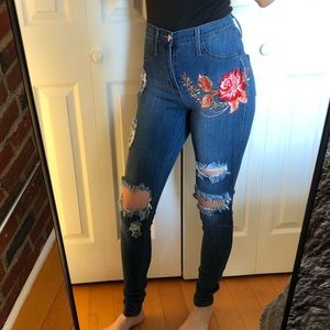 Vibrant MIU embroidered floral high waisted jeans